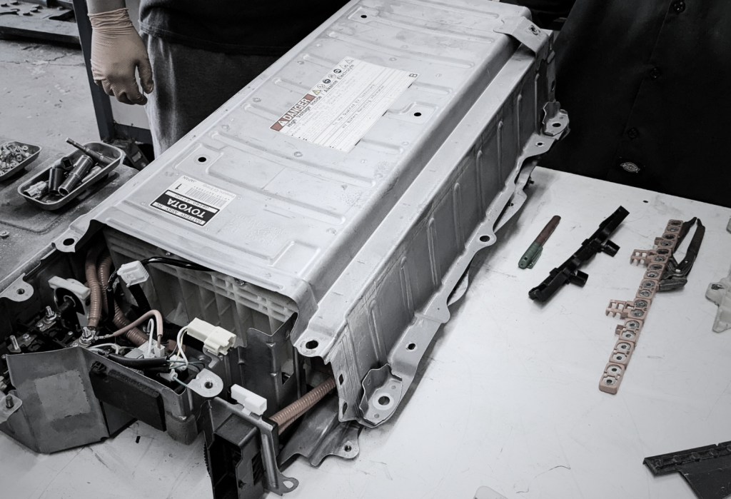 Toyota and Tesla Service Center expert technicians performing hybrid and EV battery repair and replacement in Santa Clara, CA